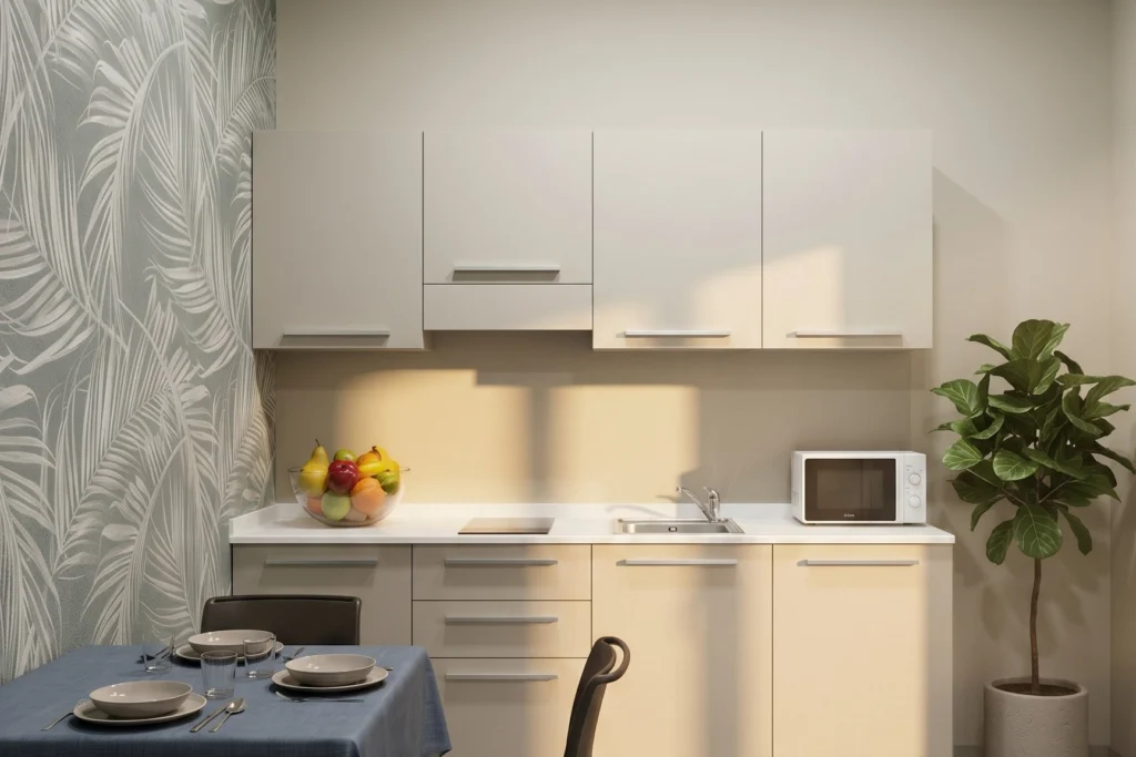 Cucina dell'alloggio con blocco attrezzato e tavolo da pranzo — cohousing, progetto San Paolo