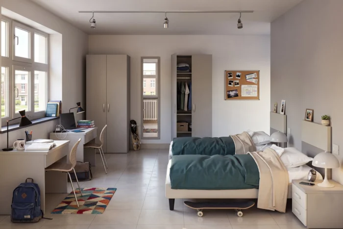 Camera singola con scrivania, armadio e letto imbottito — residenza universitaria, progetto Studentati